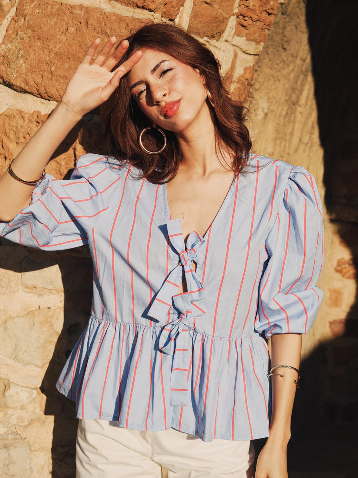Blouse à rayures et noeud frontal