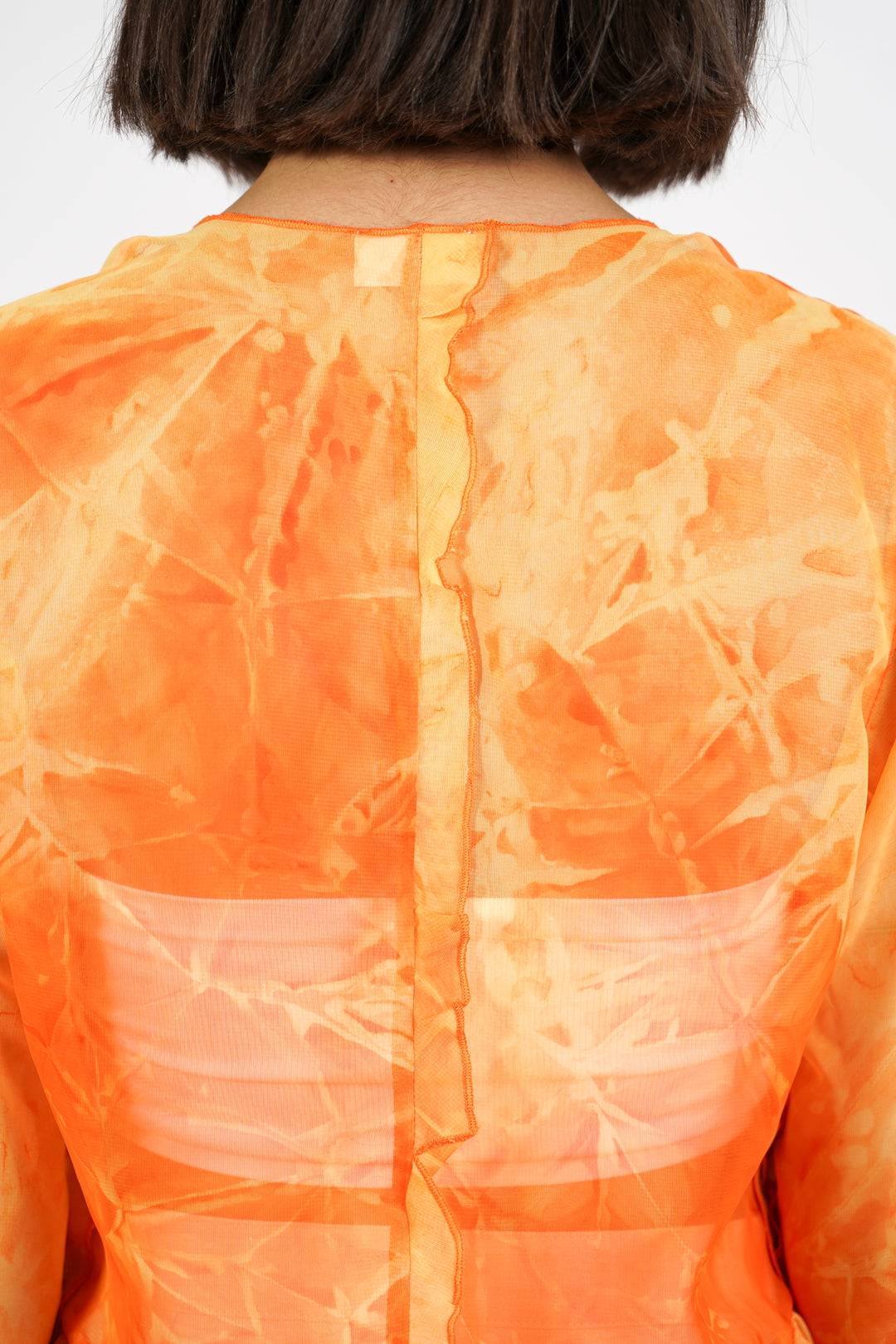 Chemisier orange transparent