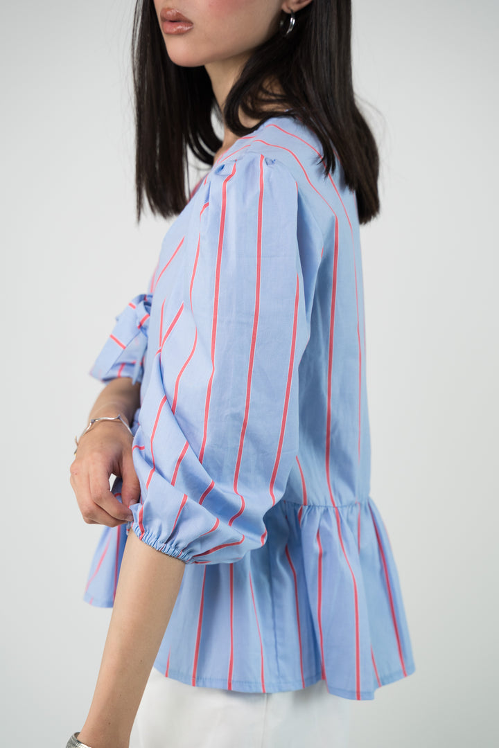 Blouse à rayures et noeud frontal