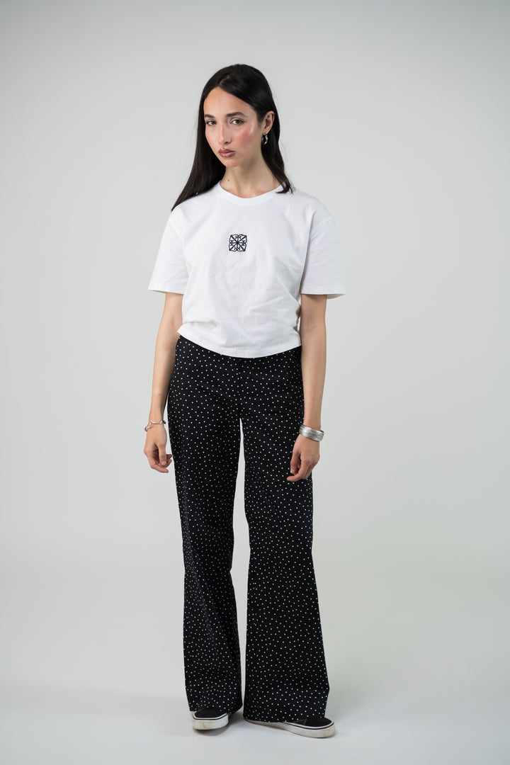 Pantalon noir a petits pois