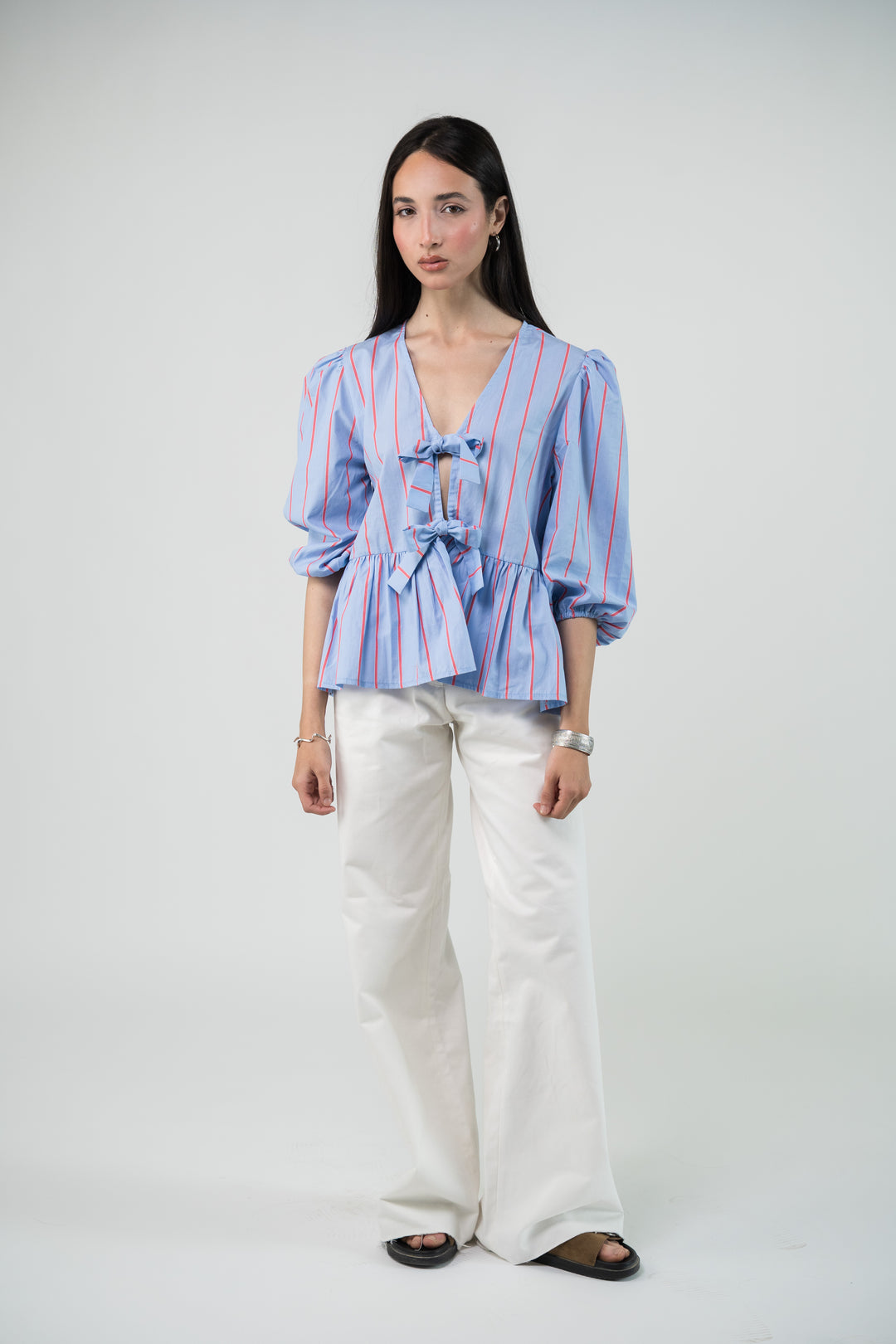 Blouse à rayures et noeud frontal