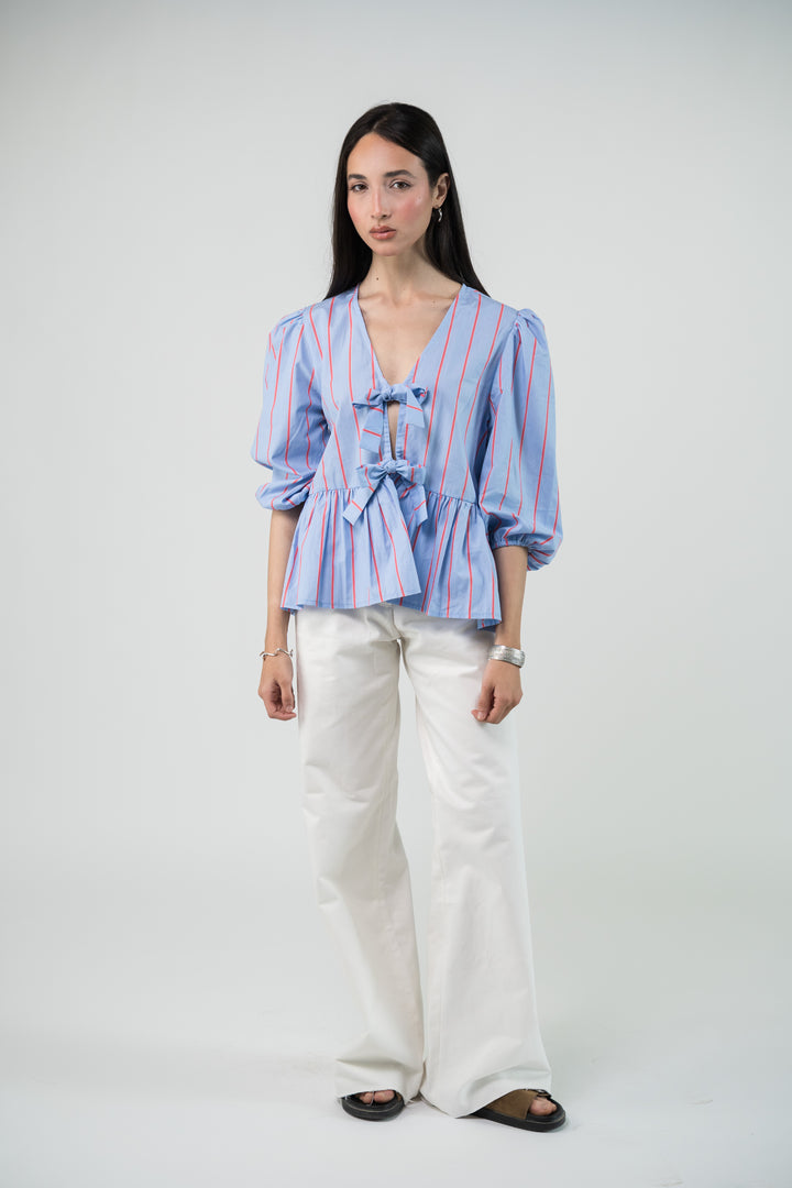 Blouse à rayures et noeud frontal