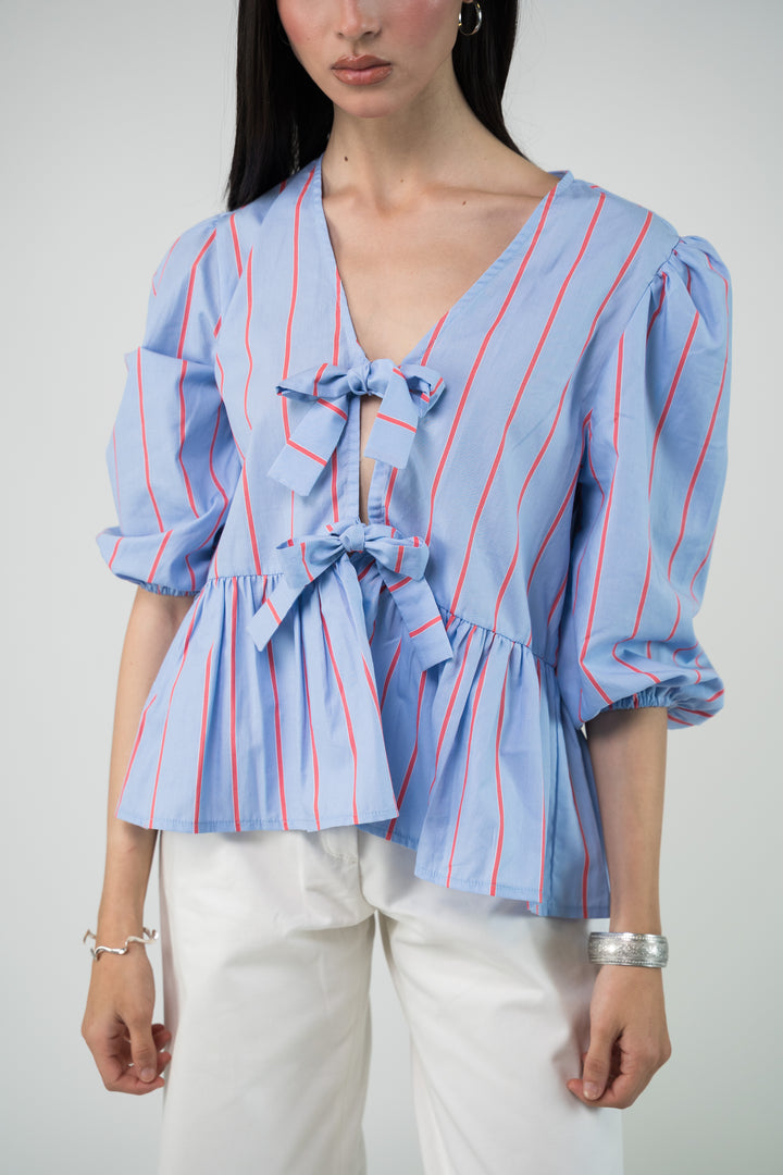 Blouse à rayures et noeud frontal